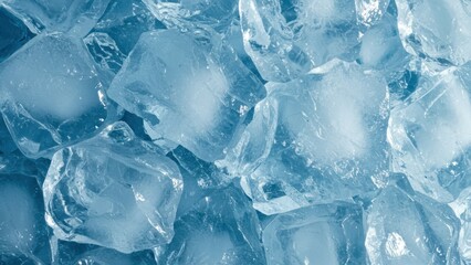 Close-up view of a pile of clear and blue ice cubes. Cooling, icy freshness.