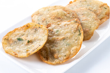 Tortillitas de camarones isolated on white background. Typical Andalucia food.