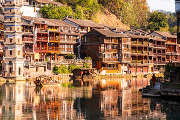 Fenghuang ancient town, China. Traditional chinese wooden houses in old watertown