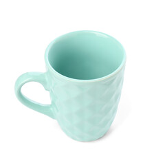 Blue ceramic cup on white background