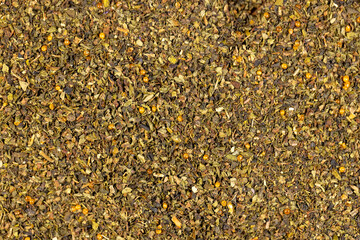 dried tea leaves, ground and crumbled into very small pieces