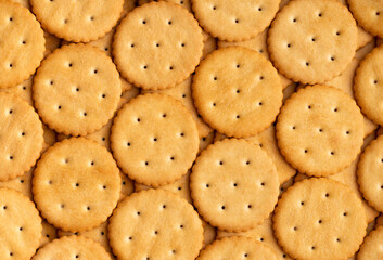 Macro shot of round salty cracker cookies. Snacks. Beer snack. 