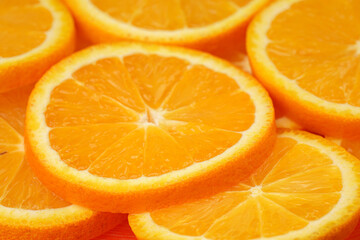 Marco shot an orange and turned it. Citrus. Close-up of citrus orange pulp. Orange slices. Fruit background.
