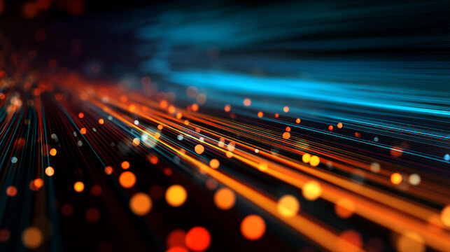 Abstract orange glowing particles on dark background. A computer screen with a series of numbers and letters