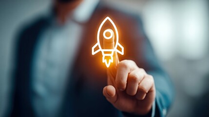 A business person's finger touching an illuminated rocket, signifying a new launch or start.
