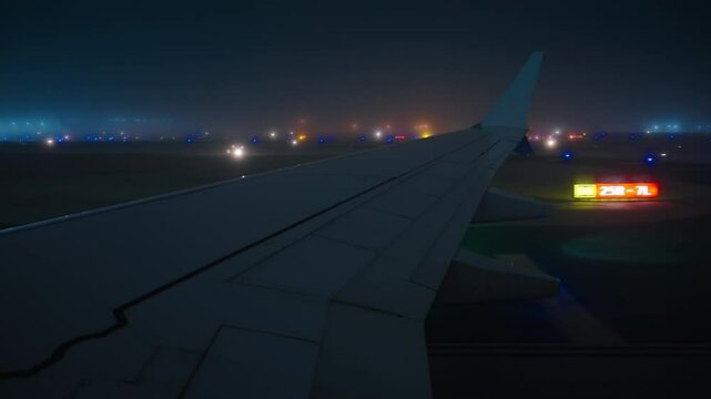 Airport LAX, Los Angeles, California, USA - MARCH 18, 2025: The captivating view from an airplane window as it carefully taxis toward the gate in the midst of foggy weather conditions is mesmerizing