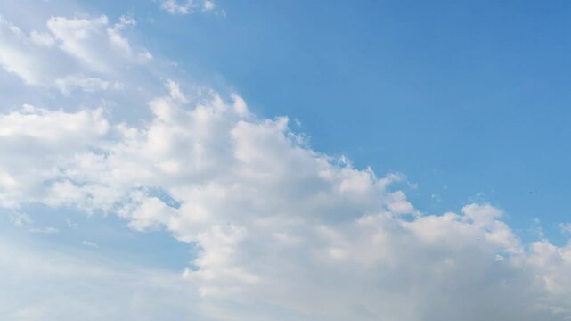 4k timelapse footage of clouds in the shape of rolling cabbages that are so beautiful in the blue sky