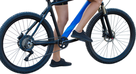Girl on a mountain bike on offroad, beautiful portrait of a cyclist, Fitness girl rides a modern carbon fiber mountain bike in sportswear.