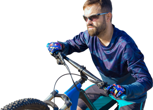 Cyclist in shorts and jersey on a modern carbon hardtail bike with an air suspension fork