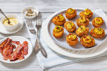 Deep fried deviled eggs with coating of panko
