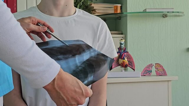 Medical examination of patient with lung X-ray illustration in clinic setting