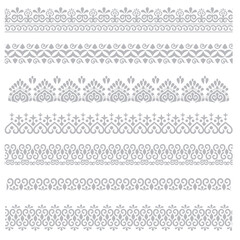 An original vintage-style design featuring an ornate heraldic crest with calligraphic details and a floral filigree pattern used as a horizontal divider