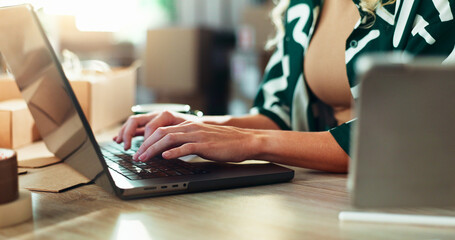 Hands, laptop and logistics with person in office for delivery or shipping schedule closeup. Computer, supply chain and typing with distribution employee in depot or warehouse for ecommerce tracking