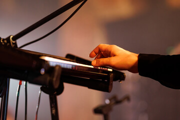 The keyboardist plays his part during the band's live performance