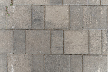 abstract background of old dirty tiles on the road in the park