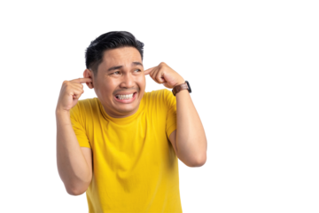 Annoyed young Asian man plugging ears with fingers showing displeased expression isolated on transparent background