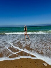 Fototapeta premium girl on the beach