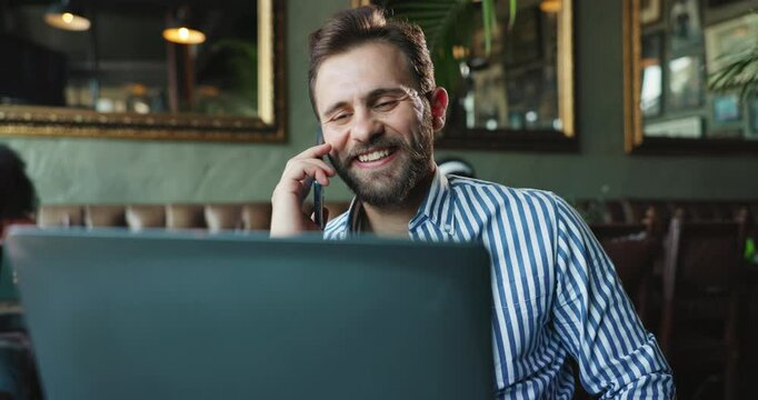 Phone call, laptop and manager or man in cafe for restaurant inventory, supplier contact and feedback. Communication, coffee shop admin and search with person online for networking and hospitality