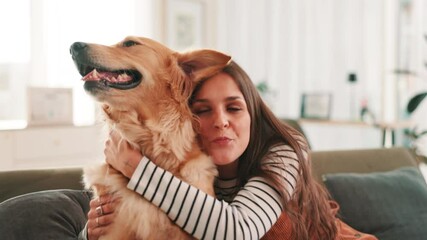 Hug, sofa and woman with dog in home for bonding, relaxing and playing together in living room. Pet owner, best friend and happy person with Golden Retriever on couch for affection, petting and love - Powered by Adobe