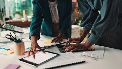 People, hands or tablet with documents for planning or brainstorming together on office desk. Team, employees or group of designers with paperwork for meeting, schedule agenda or ideas at workplace