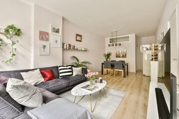 Stylish modern living room featuring contemporary furniture, elegant decor, and a cozy atmosphere, perfect for relaxation and entertaining.