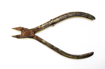 Obraz premium Rustic, aged metal pliers isolated on white. Perfect for concepts of craftsmanship, repair, vintage tools, or times passage.