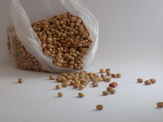 Pile and heap of a dried Red color Organic Cow Pea or Alsande Kalu in a white background.