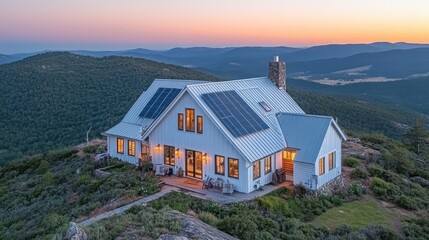 Modern house with solar panels located in beautiful mountain landscape