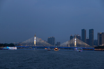 Haiyin Bridge over the Pearl River in Guangzhou, Guangdong, China at dusk