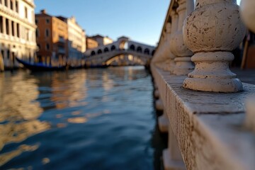 A beautiful view of the Venetian canal featuring classic railings, highlighting the intricate details while evoking a sense of nostalgia and romance unique to Venice.