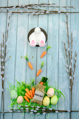 Easter Bunny jumping through fence