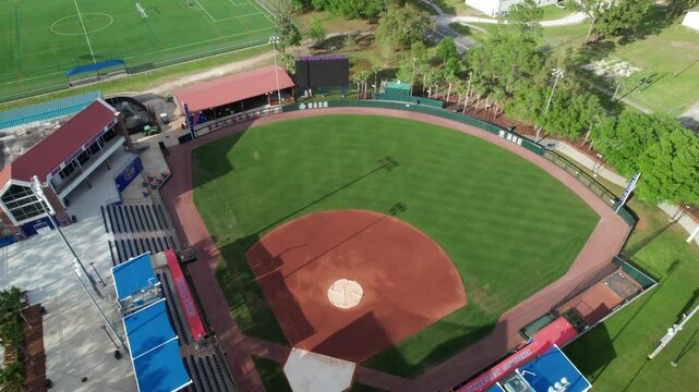Overhead aerial of a beautiful small softball stadium, 4K