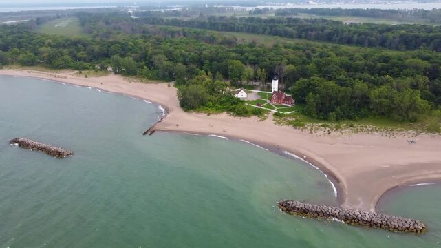 Presque Isle from the air&mdash;sweeping aerial footage captures the sandy beach, the vast Lake Erie, and the surrounding trees that complete this peaceful landscape.