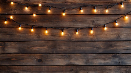 Festive string lights and snow-dusted garland on weathered wood wall, warm glowing bulbs for winter holidays, Christmas decoration, seasonal backdrop, or rustic celebration design use

