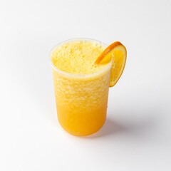 Refreshing Orange Smoothie in a Plastic Cup