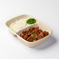 Beef and Rice with Broccoli in a Takeout Container
