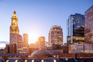 The skyline of Boston in Massachusetts, USA at sunrise showcasing the skyscrapers at Government Center in the North End of the city.