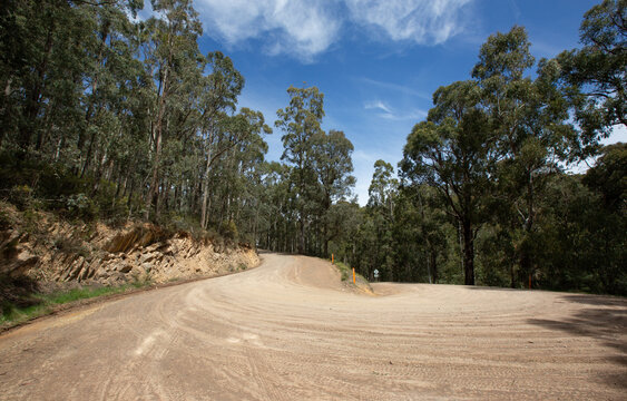Sharp bend on unsealed mountain road