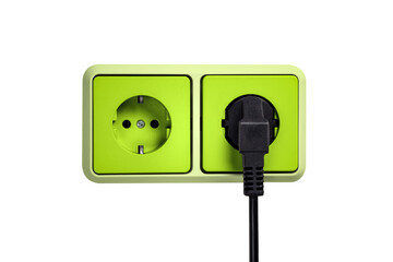 Green outlet with a plug on a wall isolated from background