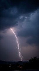 Crackling lightning illuminates a dark, stormy sky, rain lashes down - seamless design abstract