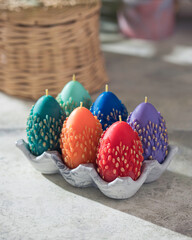 Traditional Maslenitsa: an egg-shaped candle with a willow twig. Selective focus