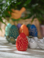 Traditional Maslenitsa: an egg-shaped candle with a willow twig. Selective focus