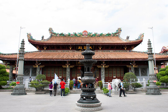 Chinese people and foriegner travelers travel visit and respect praying chinese god and chinese angel in Kaiyuan Temple at Teochew city in Chaozhou, China