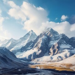 Fototapeta premium Majestic mountain range with snow-capped peaks and a breathtaking vista.