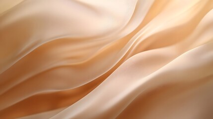 Obraz premium Soft, flowing fabric texture in warm beige tones, perfect for backgrounds and design projects.