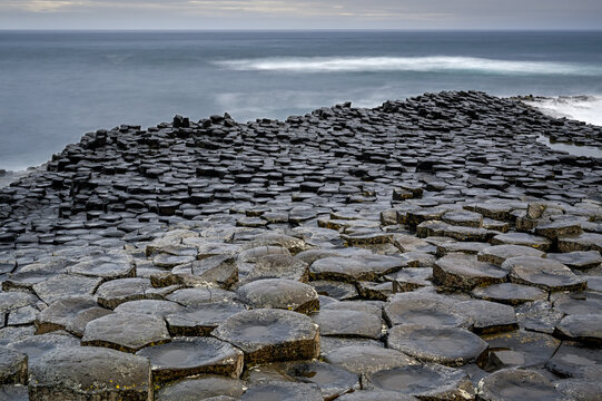 Basalt hexagonal rocks at the Giant's Causeway, UNESCO World Heritage Site, County Antrim, Northern Ireland, UK. June, 2022.