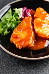 Fish tomato sauce whitefish fillet appetizer dish organic fresh tasty gourmet food background on the table rustic food top view copy space keto paleo diet vegetarian food pescetarian diet