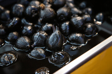 Variety of candied fruit, figs, pumpkin, plums at the 5 de Mayo municipal market in Puebla, Mexico.