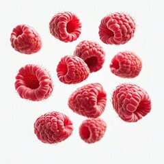Fresh raspberries in mid-air, vibrant red color