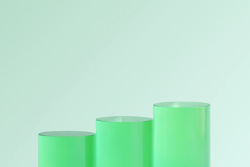 Three green cylindrical podiums, arranged in ascending order, stand out against a subtle green background. They invite attention, with the simplicity of the design.